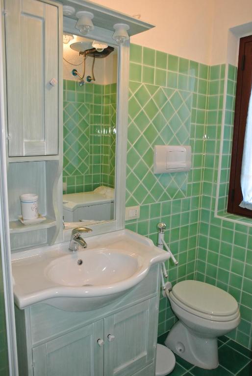 Case Vacanza Fenicotteri San Teodoro  Zimmer foto