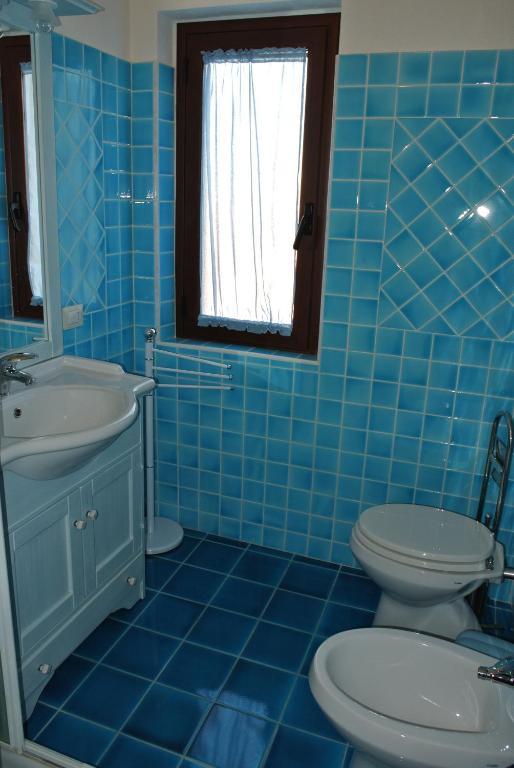 Case Vacanza Fenicotteri San Teodoro  Zimmer foto