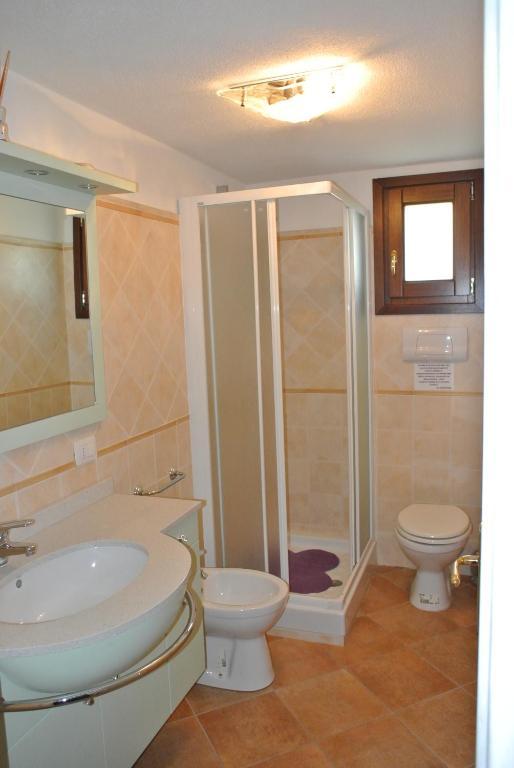 Case Vacanza Fenicotteri San Teodoro  Zimmer foto